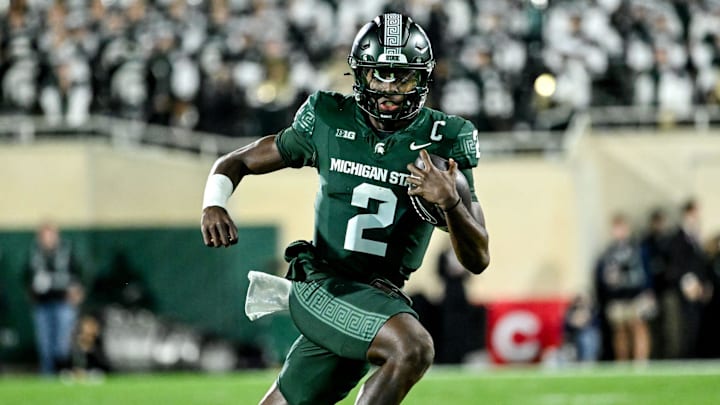 Michigan State's Aidan Chiles runs for a gain against Iowa in the second quarter on Saturday, Oct. 19, 2024, at Spartan Stadium in East Lansing.