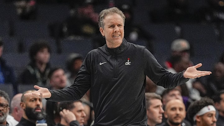 Feb 3, 2025; Charlotte, North Carolina, USA;Washington Wizards head coach Brian Keefe reacts to a call during the second half against the Charlotte Hornets at Spectrum Center. Mandatory Credit: Jim Dedmon-Imagn Images