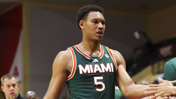 Nov 28, 2025; Kissimmee, FL, USA; Miami (FL) Hurricanes forward Malik Reneau (5) reacts to the beach after being subbed out against the Georgetown Hoyas in the second half during the ESPN Events Invitational at State Farm Field House. Mandatory Credit: Nathan Ray Seebeck-Imagn Images