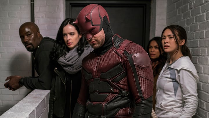 Mike Colter as Luke Cage, Krysten Ritter as Jessica Jones, Rosario Dawson as Claire Temple, Charlie Cox as Matt Murdock / Daredevil, and Jessica Henwick as Colleen Wing in Marvel's The Defenders. 