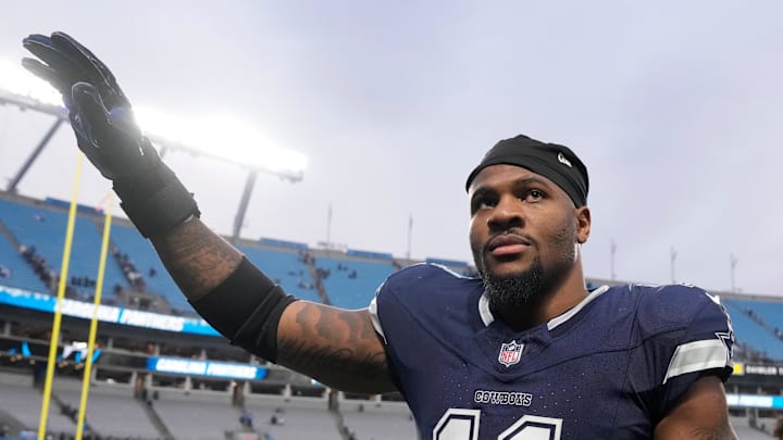 Dallas Cowboys linebacker Micah Parsons waves to fans after a game. Dallas Cowboys linebacker Micah Parsons waves to fans after a game.