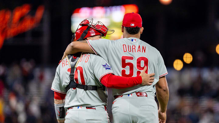 Apr 6, 2026; San Francisco, California, USA; Philadelphia Phillies catcher J.T. Realmuto (10) and Philadelphia Phillies pitcher Jhoan Duran (59) celebrate their victory against the San Francisco Giants at Oracle Park. Mandatory Credit: Bob Kupbens-Imagn Images
