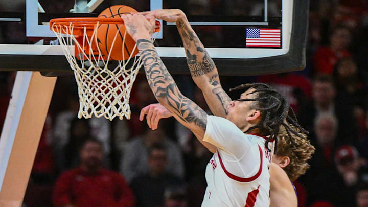 Arkansas Razorbacks forward Trevon Brazile throws down a dunk against the UCA Bears at Simmons Bank Arena in North Little Rock, Ark.
