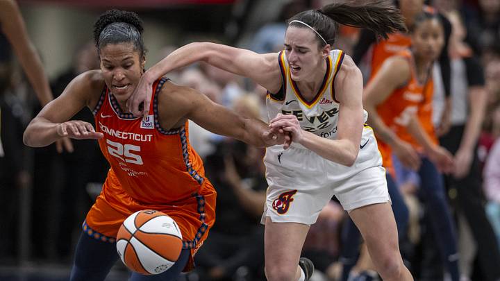 Connecticut Sun forward Alyssa Thomas (25) knocks the ball away from Indiana Fever guard Caitlin Clark (22) Connecticut Sun forward Alyssa Thomas (25) knocks the ball away from Indiana Fever guard Caitlin Clark (22)