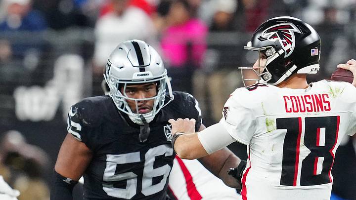 Dec 16, 2024; Paradise, Nevada, USA; Las Vegas Raiders linebacker Amari Burney (56) looks to sack Atlanta Falcons quarterback Kirk Cousins (18) during the third quarter at Allegiant Stadium. Mandatory Credit: Stephen R. Sylvanie-Imagn Images