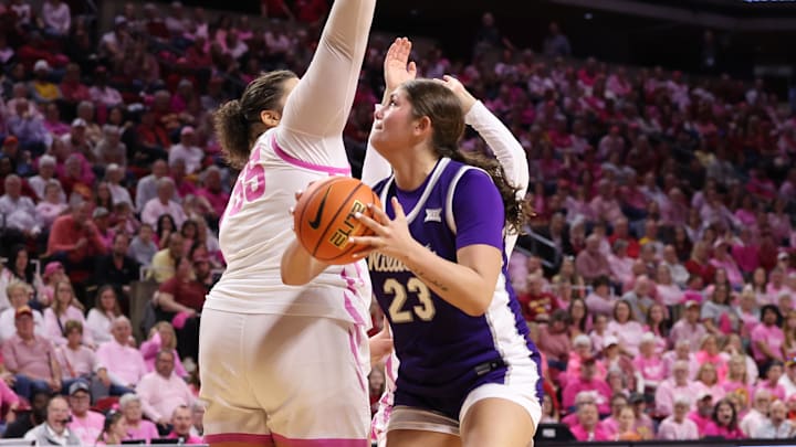 Feb 15, 2026; Ames, Iowa, USA; Iowa State Cyclones center Audi Crooks (55) defends Kansas State Wildcats guard Jordan Speiser (23) during the second half at James H. Hilton Coliseum. 