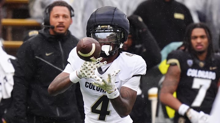 Apr 27, 2024; Boulder, CO, USA; Colorado Buffaloes wide receiver Omarion Miller (4) prepares to catch the ball during a spring game event at Folsom Field. Mandatory Credit: Ron Chenoy-Imagn Images