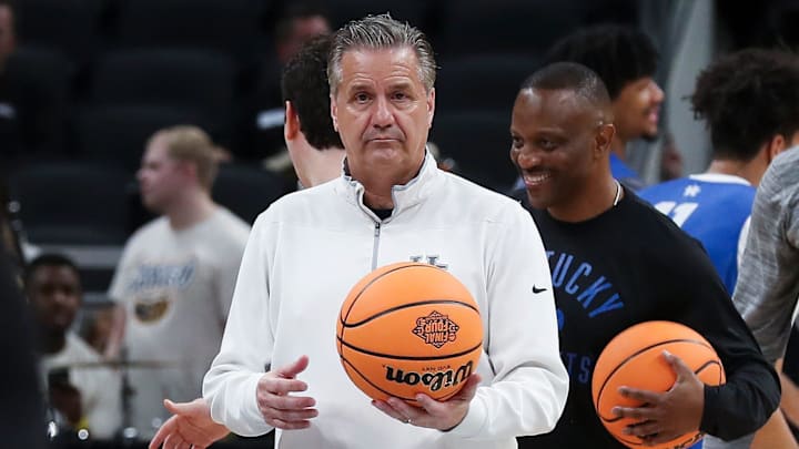 John Calipari watches Kentucky during practice ahead of a NCAA Tournament match-up against Saint Peter's at the Gainbridge Fieldhouse in Indianapolis.