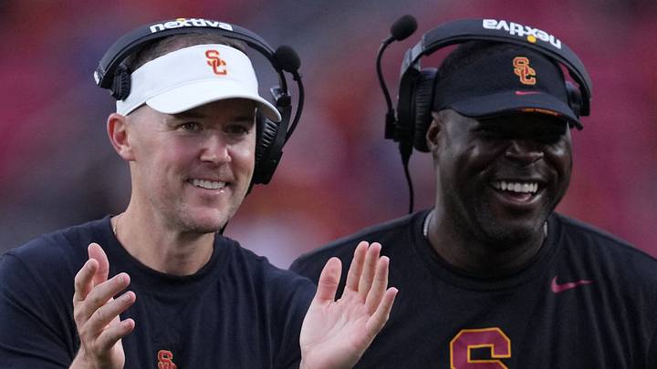 Sep 2, 2023; Los Angeles, California, USA; Southern California Trojans head coach Lincoln Riley (leff) and wide receivers coach Dennis Simmons react against the Nevada Wolf Pack in the second half at United Airlines Field at Los Angeles Memorial Coliseum. Mandatory Credit: Kirby Lee-USA TODAY Sports Sep 2, 2023; Los Angeles, California, USA; Southern California Trojans head coach Lincoln Riley (leff) and wide receivers coach Dennis Simmons react against the Nevada Wolf Pack in the second half at United Airlines Field at Los Angeles Memorial Coliseum. Mandatory Credit: Kirby Lee-USA TODAY Sports
