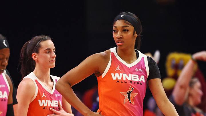 Team WNBA forward Angel Reese (5)and Team WNBA guard Caitlin Clark (22) react after a play Team WNBA forward Angel Reese (5)and Team WNBA guard Caitlin Clark (22) react after a play