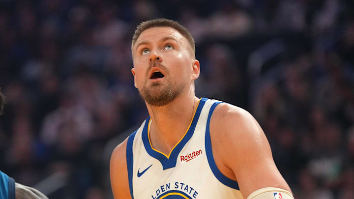 Mar 13, 2026; San Francisco, California, USA; Golden State Warriors forward Kristaps Porzingis (7) and Minnesota Timberwolves forward Julius Randle (30) watch a free throw attempt in the first quarter at the Chase Center. Mandatory Credit: Cary Edmondson-Imagn Images