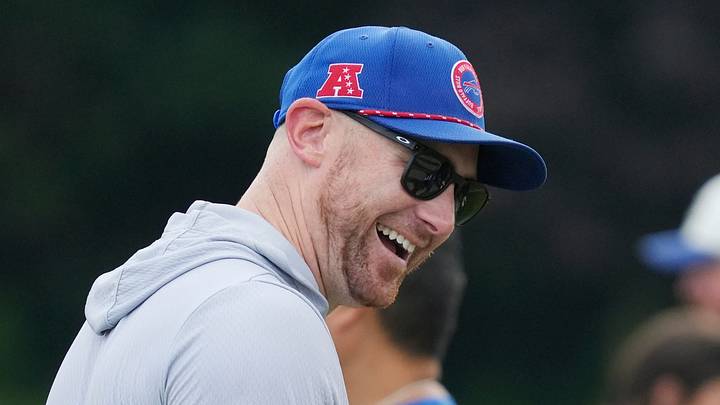 Bills head coach Joe Brady laughs with players at the end of day six of Buffalo Bills training camp at St. John Fisher University Thursday, August 5, 2026 in Pittsford. Bills head coach Joe Brady laughs with players at the end of day six of Buffalo Bills training camp at St. John Fisher University Thursday, August 5, 2026 in Pittsford.