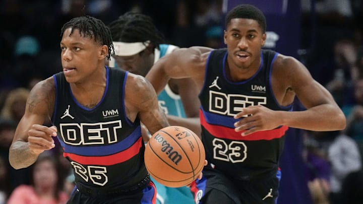 Oct 27, 2023; Charlotte, North Carolina, USA; Detroit Pistons guard Marcus Sasser (25) brings the ball up court with guard Jaden Ivey (23) against the Charlotte Hornets during the second half at Spectrum Center. Mandatory Credit: Jim Dedmon-Imagn Images
