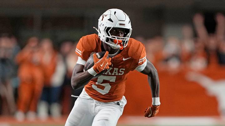 Nov 28, 2025; Austin, Texas, USA; Texas Longhorns running back Quintrevion Wisner (5) runs down the sideline during the first half against the Texas A&M Aggies at Darrell K Royal-Texas Memorial Stadium. Mandatory Credit: Scott Wachter-Imagn Images
