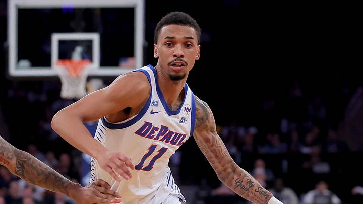 Mar 11, 2026; New York, NY, USA; DePaul Blue Demons guard CJ Gunn (11) drives to the basket against Georgetown Hoyas forward Jayden Fort (0) during the second half at Madison Square Garden. Mandatory Credit: Brad Penner-Imagn Images Mar 11, 2026; New York, NY, USA; DePaul Blue Demons guard CJ Gunn (11) drives to the basket against Georgetown Hoyas forward Jayden Fort (0) during the second half at Madison Square Garden. Mandatory Credit: Brad Penner-Imagn Images