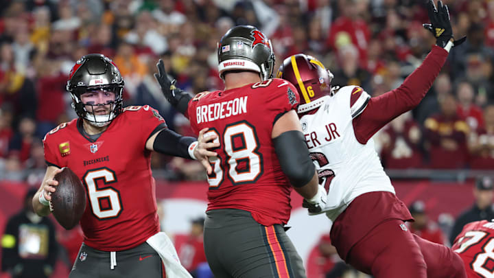 Tampa Bay Buccaneers quarterback Baker Mayfield scrambles during the second quarter of a NFC wild card playoff.
