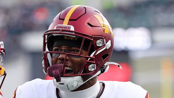 Washington Commanders wide receiver Terry McLaurin reacts after a play with wide receiver Olamide Zaccheaus.