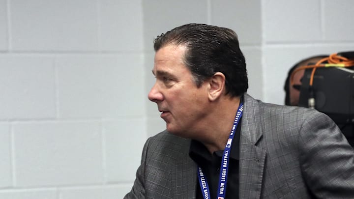 Jul 2, 2019; Arlington, TX, USA; Los Angeles Angels president John Carpino greets Texas Rangers general manager Jon Daniels before a press conference about the death of pitcher Tyler Skaggs before the game against the Texas Rangers at Globe Life Park in Arlington. Mandatory Credit: Kevin Jairaj-Imagn Images