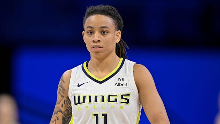 Dallas Wings guard JJ Quinerly (11) in action during the game between the Dallas Wings and the New York Liberty at College Park Center. Mandatory Credit: Jerome Miron-Imagn Images