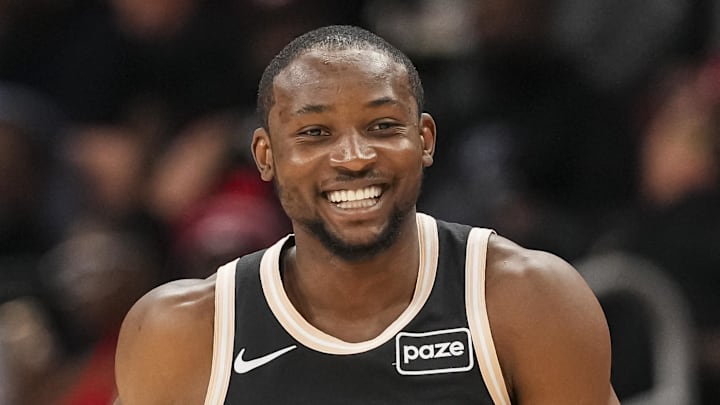 Atlanta Hawks forward Jonathan Kuminga (0) reacts after making a three point shot against the Washington Wizards during the first half at State Farm Arena on February 26, 2026. 