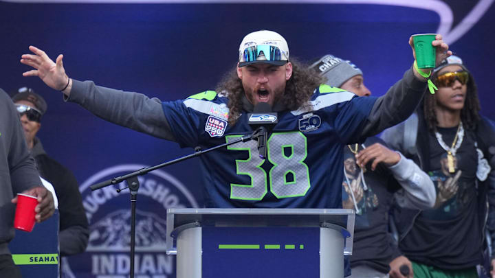 Feb 11, 2026; Seattle, WA, USA; Seattle Seahawks fullback Brady Russell (38) and tight end Elijah Arroyo (18) during the Super Bowl LX trophy celebration at Lumen Field. Mandatory Credit: Kirby Lee-Imagn Images