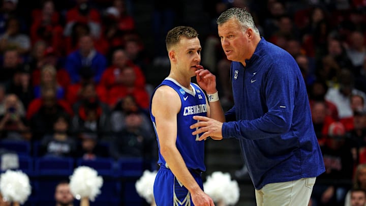 Creighton Bluejays guard Steven Ashworth (1) talks to head coach Greg McDermott