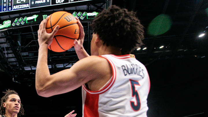 Mar 12, 2026; Kansas City, MO, USA; UCF Knights guard Riley Kugel (2) guards an inbound by Arizona Wildcats guard Brayden Burries (5) during the first half at T-Mobile Center. Mandatory Credit: William Purnell-Imagn Images