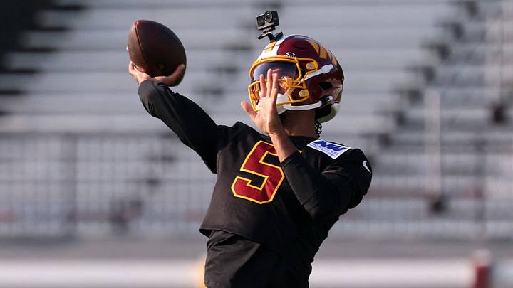 Jul 29, 2026; Ashburn, VA, USA; Washington Commanders quarterback Jayden Daniels (5) passes the ball during a drill at training camp. Action at the BigBear.ai Performance Center at Commanders Park. Mandatory Credit: Geoff Burke-Imagn Images Jul 29, 2026; Ashburn, VA, USA; Washington Commanders quarterback Jayden Daniels (5) passes the ball during a drill at training camp. Action at the BigBear.ai Performance Center at Commanders Park. Mandatory Credit: Geoff Burke-Imagn Images