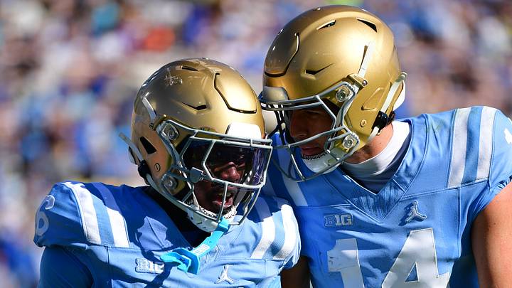 Oct 24, 2026; Pasadena, California, USA; UCLA Bruins running back Anthony Woods (6) and quarterback Ty Dieffenbach (14) celebrate after a rushing touchdown during the second half against the Michigan State Spartans at Rose Bowl. Mandatory Credit: Gary A. Vasquez-Imagn Images Oct 24, 2026; Pasadena, California, USA; UCLA Bruins running back Anthony Woods (6) and quarterback Ty Dieffenbach (14) celebrate after a rushing touchdown during the second half against the Michigan State Spartans at Rose Bowl. Mandatory Credit: Gary A. Vasquez-Imagn Images