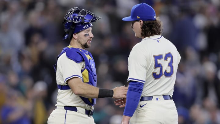 Jun 2, 2024; Seattle, Washington, USA; Seattle Mariners catcher Cal Raleigh (29) greets Seattle Mariners pitcher Mike Baumann (53) after the final out of the game against the Los Angeles Angels at T-Mobile Park. Mandatory Credit: John Froschauer-USA TODAY Sports Jun 2, 2024; Seattle, Washington, USA; Seattle Mariners catcher Cal Raleigh (29) greets Seattle Mariners pitcher Mike Baumann (53) after the final out of the game against the Los Angeles Angels at T-Mobile Park. Mandatory Credit: John Froschauer-USA TODAY Sports
