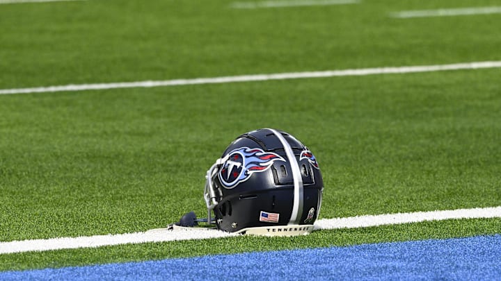 Nov 10, 2024; Inglewood, California, USA; A Tennessee Titans helmet on the turf during pregame warmups before an NFL game against the Los Angeles Chargers at SoFi Stadium. Mandatory Credit: Robert Hanashiro-Imagn Images