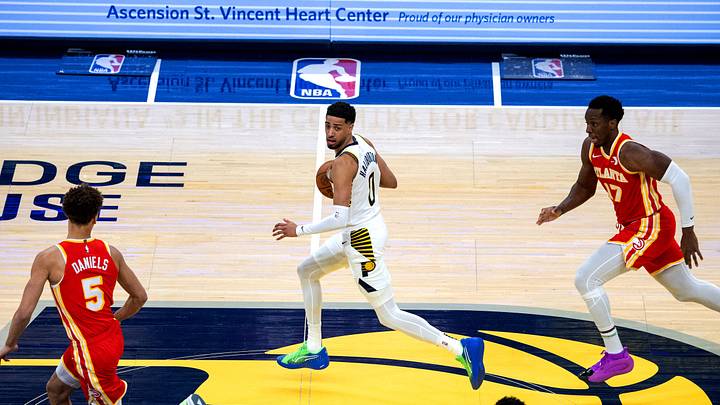 Feb 1, 2025; Indianapolis, Indiana, USA; Indiana Pacers guard Tyrese Haliburton (0) dribbles the ball against Atlanta Hawks guard Dyson Daniels (5) in the first half at Gainbridge Fieldhouse. Mandatory Credit: Trevor Ruszkowski-Imagn Images Feb 1, 2025; Indianapolis, Indiana, USA; Indiana Pacers guard Tyrese Haliburton (0) dribbles the ball against Atlanta Hawks guard Dyson Daniels (5) in the first half at Gainbridge Fieldhouse. Mandatory Credit: Trevor Ruszkowski-Imagn Images