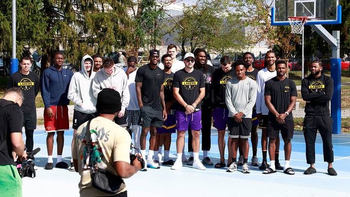 Basketball - NBA - Los Angeles Lakers visit to Ljubljana - Ljubljana, Slovenia - August 23, 2026 Los Angeles Lakers' Luka Doncic poses for a photo with teammates on the court where he played growing up in Ljubljana REUTERS/Borut Zivulovic Basketball - NBA - Los Angeles Lakers visit to Ljubljana - Ljubljana, Slovenia - August 23, 2026 Los Angeles Lakers' Luka Doncic poses for a photo with teammates on the court where he played growing up in Ljubljana REUTERS/Borut Zivulovic