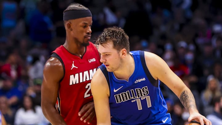 Nov 2, 2021; Dallas, Texas, USA; Dallas Mavericks guard Luka Doncic (77) dribbles as Miami Heat forward Jimmy Butler (22) defends during the fourth quarter at American Airlines Center. Mandatory Credit: Kevin Jairaj-Imagn Images Nov 2, 2021; Dallas, Texas, USA; Dallas Mavericks guard Luka Doncic (77) dribbles as Miami Heat forward Jimmy Butler (22) defends during the fourth quarter at American Airlines Center. Mandatory Credit: Kevin Jairaj-Imagn Images