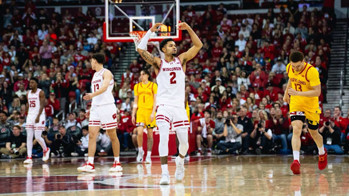 Wisconsin senior Nick Boyd pumps up the crowd during the Badgers' 78-45 victory over Maryland. He finished with 13 points.