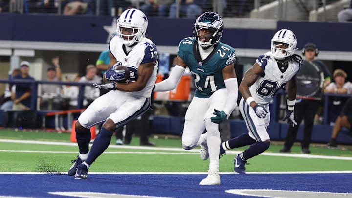 Dec 10, 2023; Arlington, Texas, USA; Dallas Cowboys wide receiver Michael Gallup (13) catches a touchdown pass against Philadelphia Eagles cornerback James Bradberry (24) in the second quarter at AT&T Stadium. Mandatory Credit: Tim Heitman-USA TODAY Sports