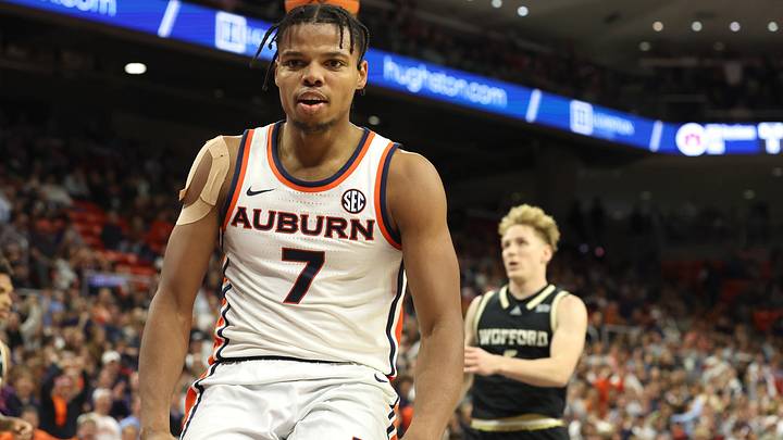 Nov 11, 2025; Auburn, Alabama, USA; Auburn Tigers guard Keyshawn Hall (7) reacts after making a dunk on the Wofford Terriers during the second half at Neville Arena. Mandatory Credit: John Reed-Imagn Images