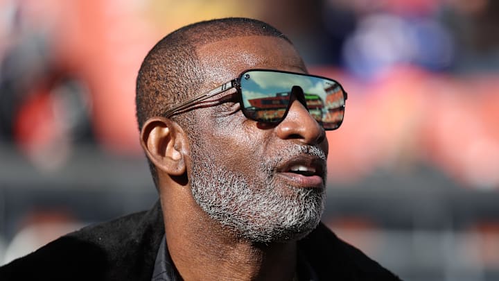 Dec 21, 2025; Cleveland, Ohio, USA;  Legendary  football and baseball player and father of Cleveland Browns quarterback Shedeur Sanders, Deion Sanders on the sidelines prior to a game against the Buffalo Bills at Huntington Bank Field. Mandatory Credit: Scott Galvin-Imagn Images