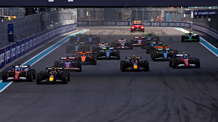 May 4, 2024; Miami Gardens, Florida, USA; Red Bull Racing driver Max Verstappen (1) leads the start of the F1 Sprint Race at Miami International Autodrome. Mandatory Credit: Peter Casey-Imagn Images