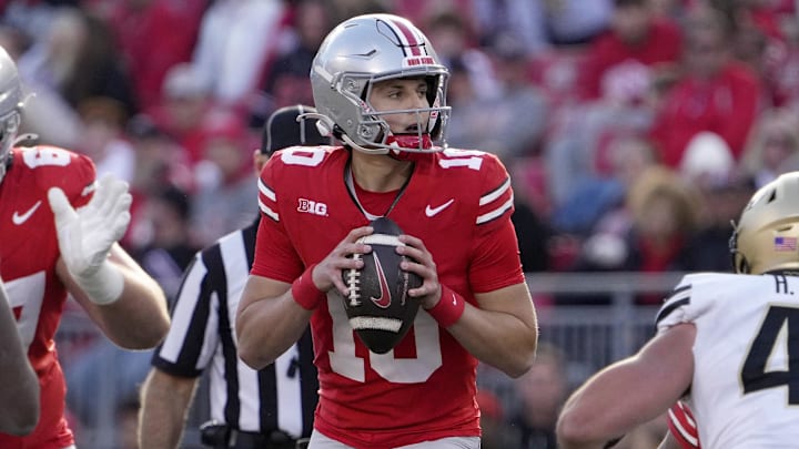 Nov 9, 2024; Columbus, Ohio, USA; Ohio State Buckeyes quarterback Julian Sayin (10) looks for an open man during the second half at Ohio Stadium. Mandatory Credit: Barbara Perenic/USA TODAY Network via Imagn Images