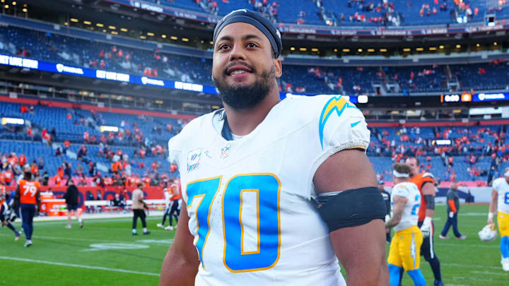 Oct 13, 2024; Denver, Colorado, USA; Los Angeles Chargers offensive tackle Rashawn Slater (70) following the win over the Denver Broncos at Empower Field at Mile High. Mandatory Credit: Ron Chenoy-Imagn Images Oct 13, 2024; Denver, Colorado, USA; Los Angeles Chargers offensive tackle Rashawn Slater (70) following the win over the Denver Broncos at Empower Field at Mile High. Mandatory Credit: Ron Chenoy-Imagn Images