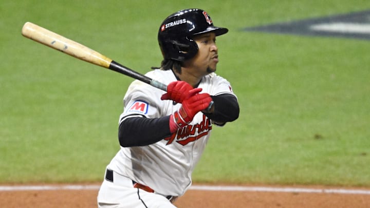 Oct 18, 2024; Cleveland, Ohio, USA; Cleveland Guardians third baseman Jose Ramirez (11) hits an RBI double in the seventh inning against the New York Yankees during game four of the ALCS for the 2024 MLB playoffs at Progressive Field. Mandatory Credit: David Richard-Imagn Images