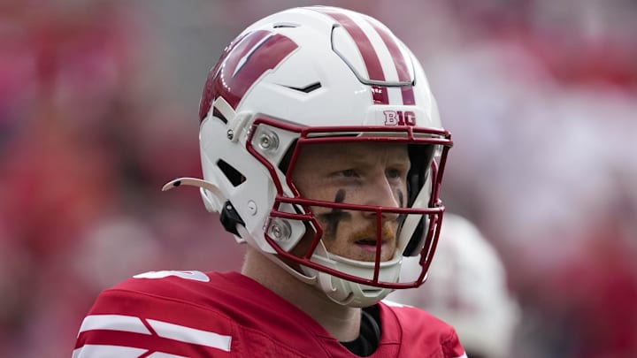Sep 20, 2025; Madison, Wisconsin, USA;  Wisconsin Badgers quarterback Billy Edwards Jr. (9) looks to the sidelines between plays during the game against the Maryland Terrapins at Camp Randall Stadium. Mandatory Credit: Jeff Hanisch-Imagn Images