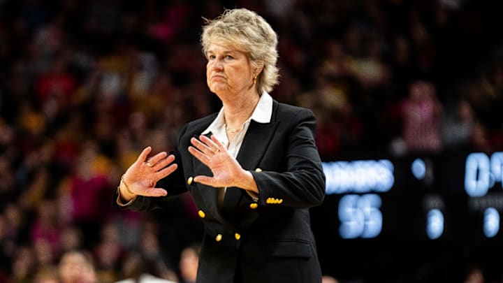 Iowa Head Coach Lisa Bluder talks with her players during a game against Nebraska Cornhuskers