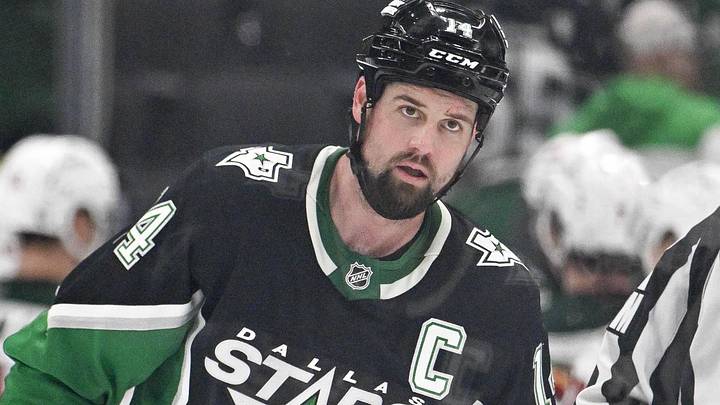 Apr 28, 2026; Dallas, Texas, USA; Dallas Stars left wing Jamie Benn (14) skates off the ice as the Minnesota Wild celebrate their win over the Stars in game five of the first round of the 2026 Stanley Cup Playoffs at American Airlines Center. Mandatory Credit: Jerome Miron-Imagn Images