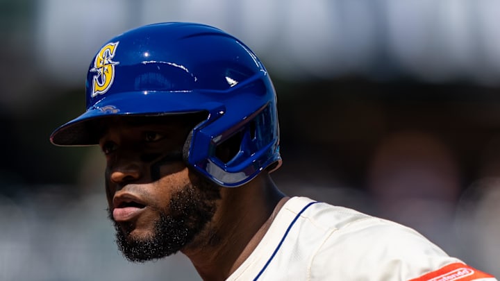 Seattle Mariners right fielder Victor Robles celebrates after hitting a single against the Athletics on Sept. 24 at T-Mobile Park.