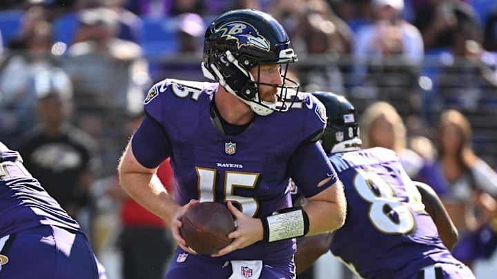 Oct 5, 2025; Baltimore, Maryland, USA; Baltimore Ravens quarterback Cooper Rush (15) looks back to pass during the third quarter against the Houston Texans at M&T Bank Stadium. Mandatory Credit: Rafael Suanes-Imagn Images