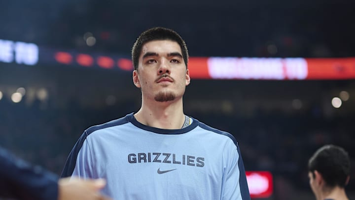Mar 19, 2025; Portland, Oregon, USA; Memphis Grizzlies center Zach Edey (14) high fives teammates during introductions before a game against the Portland Trail Blazers at Moda Center. Mandatory Credit: Troy Wayrynen-Imagn Images Mar 19, 2025; Portland, Oregon, USA; Memphis Grizzlies center Zach Edey (14) high fives teammates during introductions before a game against the Portland Trail Blazers at Moda Center. Mandatory Credit: Troy Wayrynen-Imagn Images
