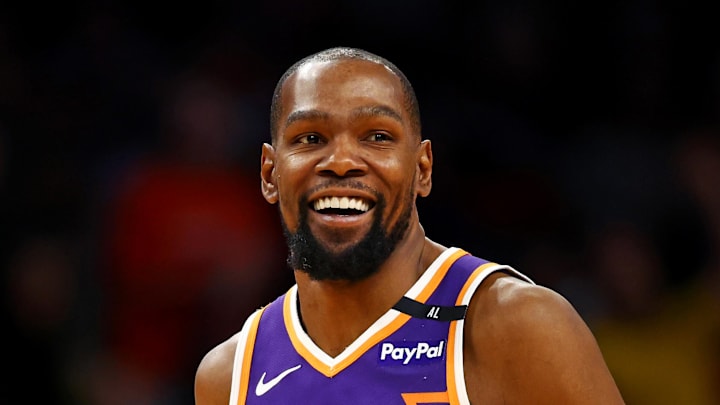 Mar 24, 2025; Phoenix, Arizona, USA; Phoenix Suns forward Kevin Durant (35) celebrates after a play during the fourth quarter against the Milwaukee Bucks at Footprint Center. Mandatory Credit: Mark J. Rebilas-Imagn Images