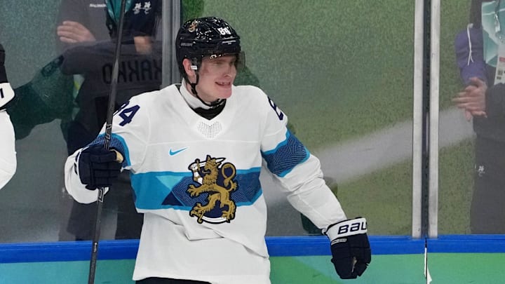 Feb 21, 2026; Milan, Italy; Kaapo Kakko of Finland celebrates after scoring their fourth goal against Slovakia in the men's ice hockey bronze medal game during the Milano Cortina 2026 Olympic Winter Games at Milano Santagiulia Ice Hockey Arena. Mandatory Credit: James Lang-Imagn Images